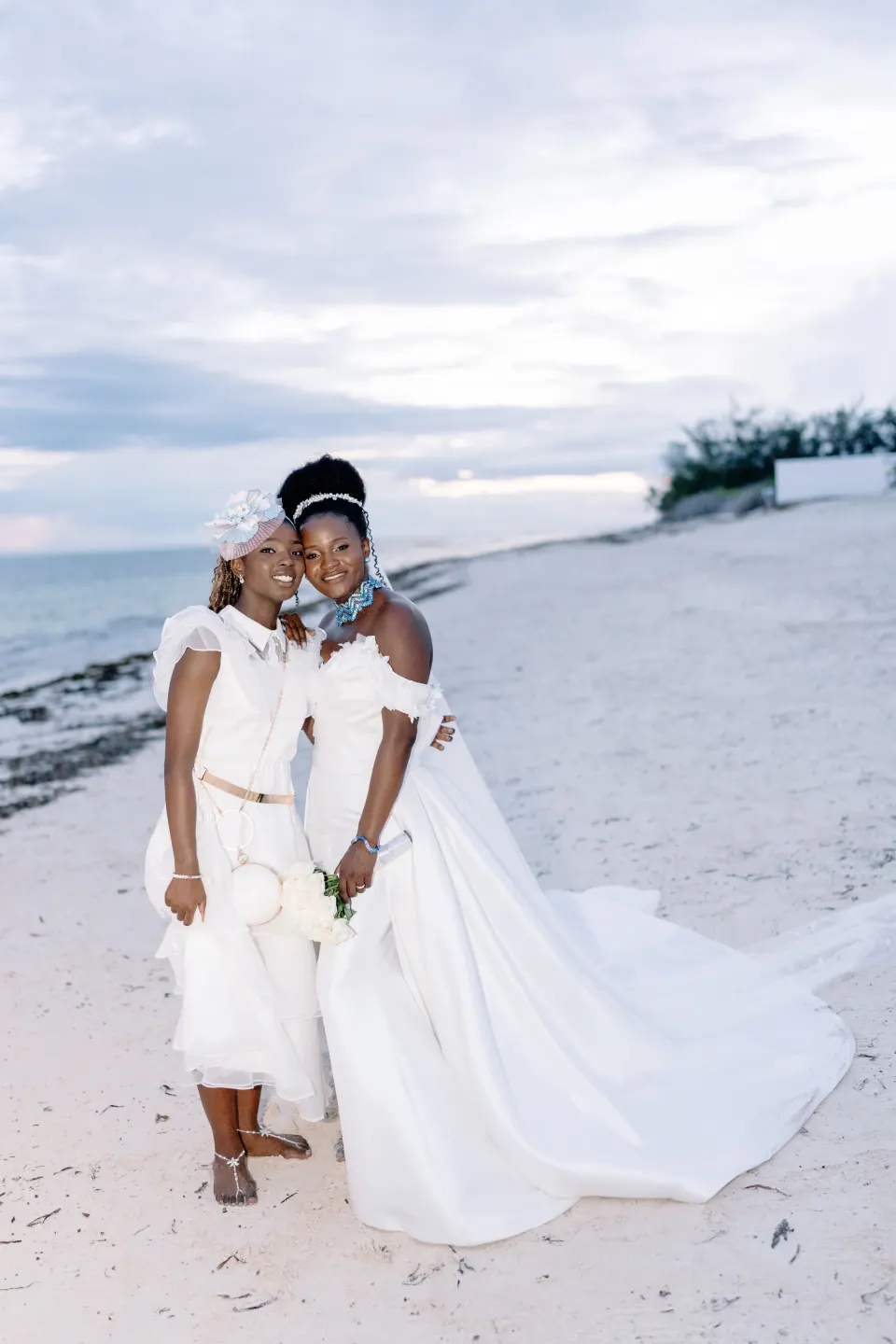 Betty and a friend in white on the beach
