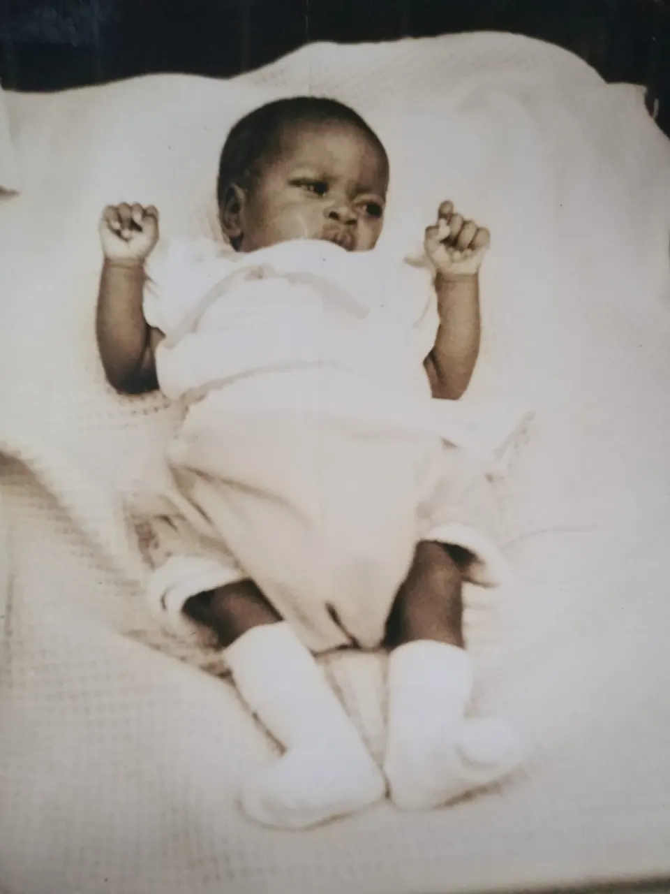 Baby Betty on a white blanket